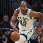 
              Boston Celtics center Al Horford (42) dribbles downcourt during the second half of Game 4 of the NBA basketball playoffs Eastern Conference finals against the Miami Heat, Monday, May 23, 2022, in Boston. (AP Photo/Charles Krupa)
            