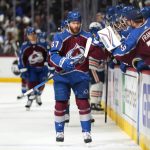 
              Colorado Avalanche left wing J.T. Compher (37) celebrates a goal against the Edmonton Oilers during the first period in Game 1 of the NHL hockey Stanley Cup playoff sWestern Conference finals Tuesday, May 31, 2022, in Denver. (AP Photo/Jack Dempsey)
            