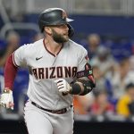 
              Arizona Diamondbacks Christian Walker (53) hits a home run during the second inning of a baseball game against the Miami Marlins, Tuesday, May 3, 2022, in Miami. (AP Photo/Marta Lavandier)
            