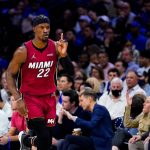 
              Miami Heat's Jimmy Butler gestures as he runs down the court during the second half of Game 6 of an NBA basketball second-round playoff series against the Philadelphia 76ers, Thursday, May 12, 2022, in Philadelphia. (AP Photo/Matt Slocum)
            
