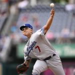 
              Los Angeles Dodgers starting pitcher Julio Urias throws during the first inning of a baseball game against the Washington Nationals, Wednesday, May 25, 2022, in Washington. (AP Photo/Nick Wass)
            