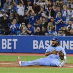 
              Toronto Blue Jays first baseman Vladimir Guerrero Jr. (27) celebrates after the Blue Jays defeated the New York Yankees in a baseball game Wednesday, May 4, 2022, in Toronto. (Christopher Katsarov/The Canadian Press via AP)
            