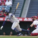 
              Tampa Bay Rays' Yandy Diaz (2) singles during the first inning of a baseball game against the Los Angeles Angels in Anaheim, Calif., Monday, May 9, 2022. (AP Photo/Ashley Landis)
            