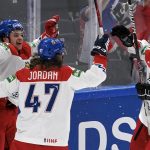 
              Matej Blumel, left, Michal Jordan and Hynek Zohorna of Czech Republic celebrate the game opening goal by Blumel during the group B Hockey World Championship match between USA and Czech Republic in Tampere, Finland, Monday, May 23, 2022. (Jussi Nukari/Lehtikuva via AP)
            