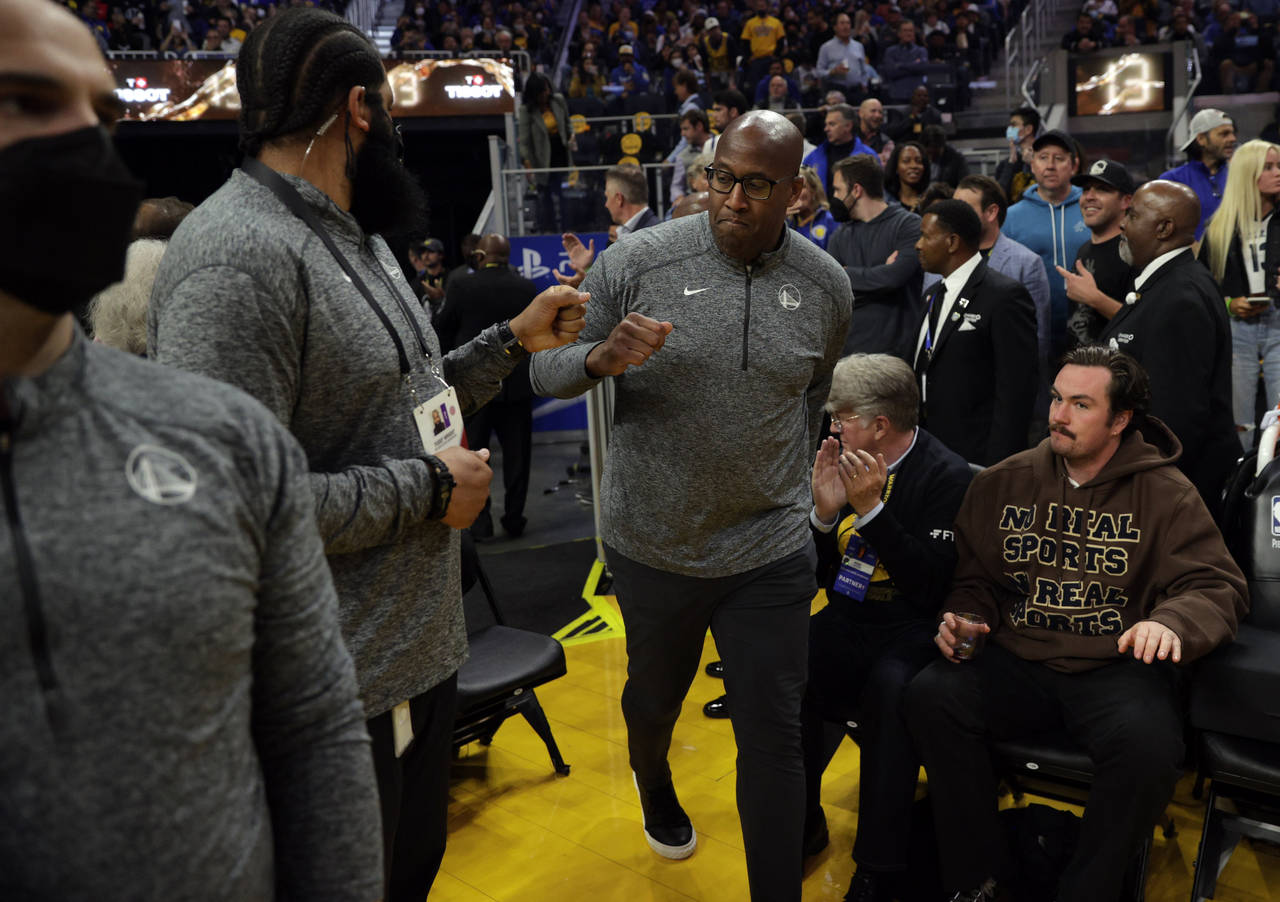 Assistant coach Mike Brown enters the court to take the helm as Steve Kerr entered Covid protocols ...
