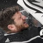 
              Los Angeles Kings goaltender Jonathan Quick sprays his face with water prior to Game 6 of an NHL hockey Stanley Cup first-round playoff series against the Edmonton Oilers Thursday, May 12, 2022, in Los Angeles. (AP Photo/Mark J. Terrill)
            