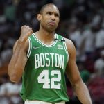 
              Boston Celtics center Al Horford (42) gestures after scoring a point during the second half of Game 2 of the NBA basketball Eastern Conference finals playoff series against the Miami Heat, Thursday, May 19, 2022, in Miami. (AP Photo/Lynne Sladky)
            