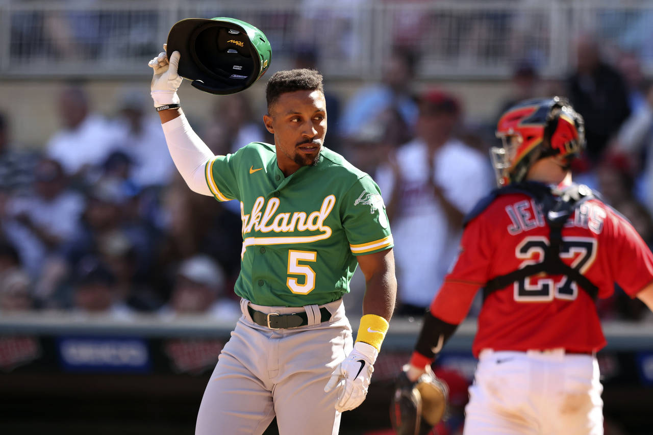 Oakland Athletics second baseman Tony Kemp (5) reacts after striking out in the eighth inning of a ...