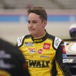 
              Christopher Bell walks in pit row during qualifying for the NASCAR All-Star auto race at Texas Motor Speedway in Fort Worth, Texas, Saturday, May 21, 2022. (AP Photo/LM Otero)
            