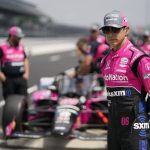 
              Helio Castroneves, of Brazil, stands in fron of his car during practice for the Indianapolis 500 auto race at Indianapolis Motor Speedway, Thursday, May 19, 2022, in Indianapolis. (AP Photo/Darron Cummings)
            