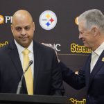 
              Omar Khan, the new general manager of the Pittsburgh Steelers, left, is introduced by Steelers owner Art Rooney II during an NFL football press conference at the team's training facility in Pittsburgh, Friday, May 27, 2022. (AP Photo/Gene J. Puskar)
            