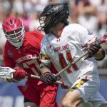 
              Maryland midfielder Jack Brennan (41) plays against Cornell midfielder Harrison Bardwell (17) during the 1st half of the NCAA college men's lacrosse championship game, Monday, May 30, 2022, in East Hartford, Conn. (AP Photo/Bryan Woolston)
            