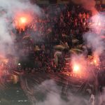 
              Fans light flares ahead the Europa Conference League final between AS Roma and Feyenoord at National Arena in Tirana, Albania, Wednesday, May 25, 2022. (AP Photo/Antonio Calanni)
            