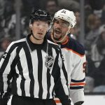 
              Edmonton Oilers left wing Evander Kane, right, yells at linesman Bryan Pancich during the first period in Game 4 of an NHL hockey Stanley Cup first-round playoff series against the Los Angeles Kings Sunday, May 8, 2022, in Los Angeles. (AP Photo/Mark J. Terrill)
            