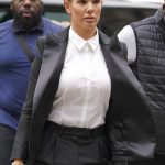 
              Rebekah Vardy arrives at the Royal Courts Of Justice in London, Friday May 13, 2022. A trial involving two soccer spouses, one of whom publicly called out the other for allegedly leaking her private social media posts to a British tabloid newspaper, opened last Tuesday in London. Vardy, 40, sued for libel after Coleen Rooney, 36, accused her of sharing the Instagram content with The Sun newspaper in October 2019. (Yui Mok/PA via AP)
            