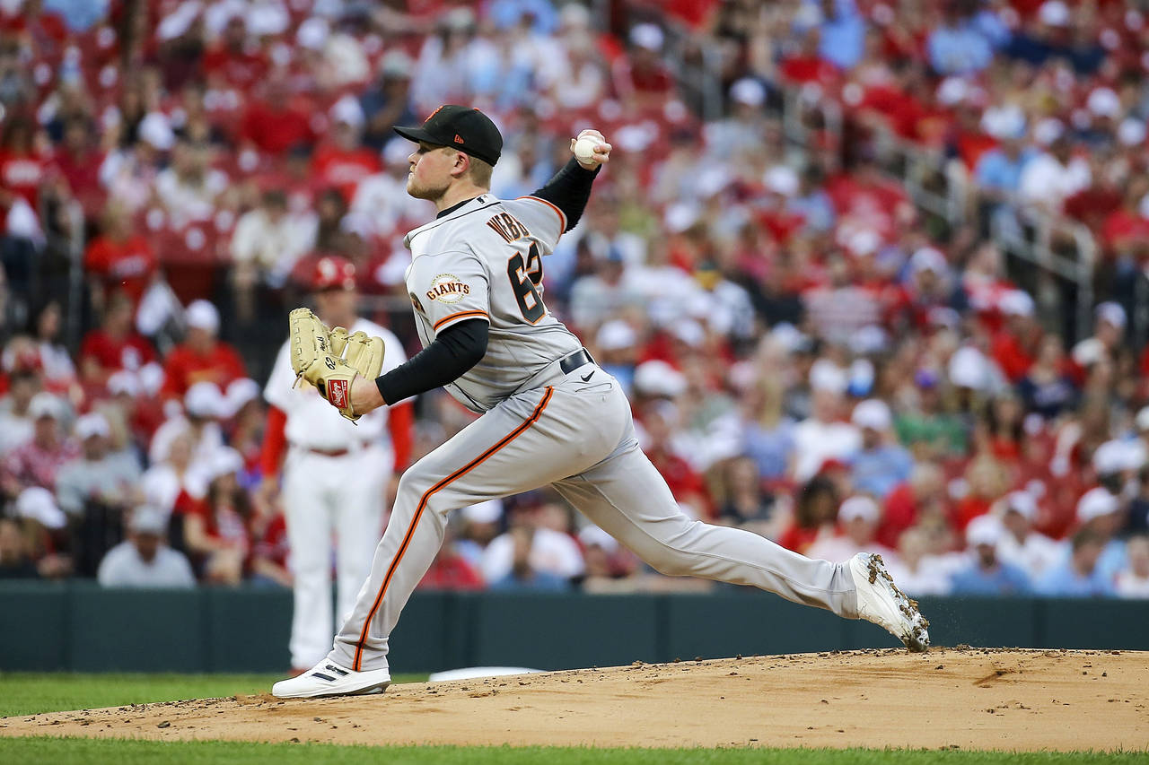 San Francisco Giants starting pitcher Logan Webb (62) throws during the first inning of a baseball ...