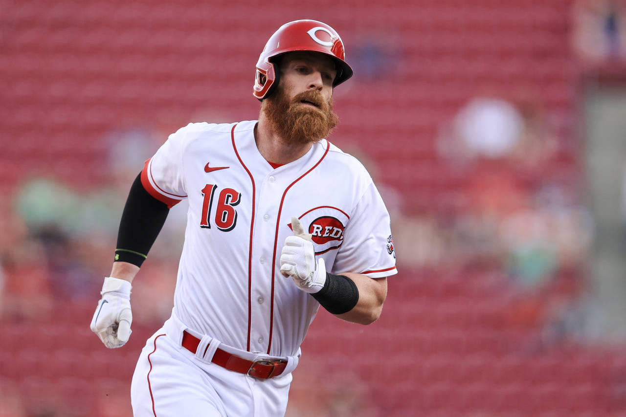 Cincinnati Reds' Colin Moran runs the bases after hitting a solo home run during the second inning ...