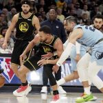
              Memphis Grizzlies' Dillon Brooks (24) and Golden State Warriors' Stephen Curry (30) chase a loose ball in the first half of Game 5 of an NBA basketball second-round playoff series Wednesday, May 11, 2022, in Memphis, Tenn. (AP Photo/Karen Pulfer Focht)
            