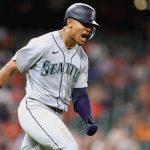 HOUSTON, TEXAS - JUNE 06: Julio Rodriguez #44 of the Seattle Mariners reacts to hitting a two ruhn home run during the ninth inning against the Houston Astros at Minute Maid Park on June 06, 2022 in Houston, Texas. (Photo by Carmen Mandato/Getty Images)