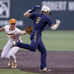 
              Tennessee pitcher Blade Tidwell (29) tags out Notre Dame's Jack Brannigan (9) after Brannigan got caught in a rundown in the third inning during an NCAA college baseball super regional game Friday, June 10, 2022, in Knoxville, Tenn. (AP Photo/Randy Sartin)
            