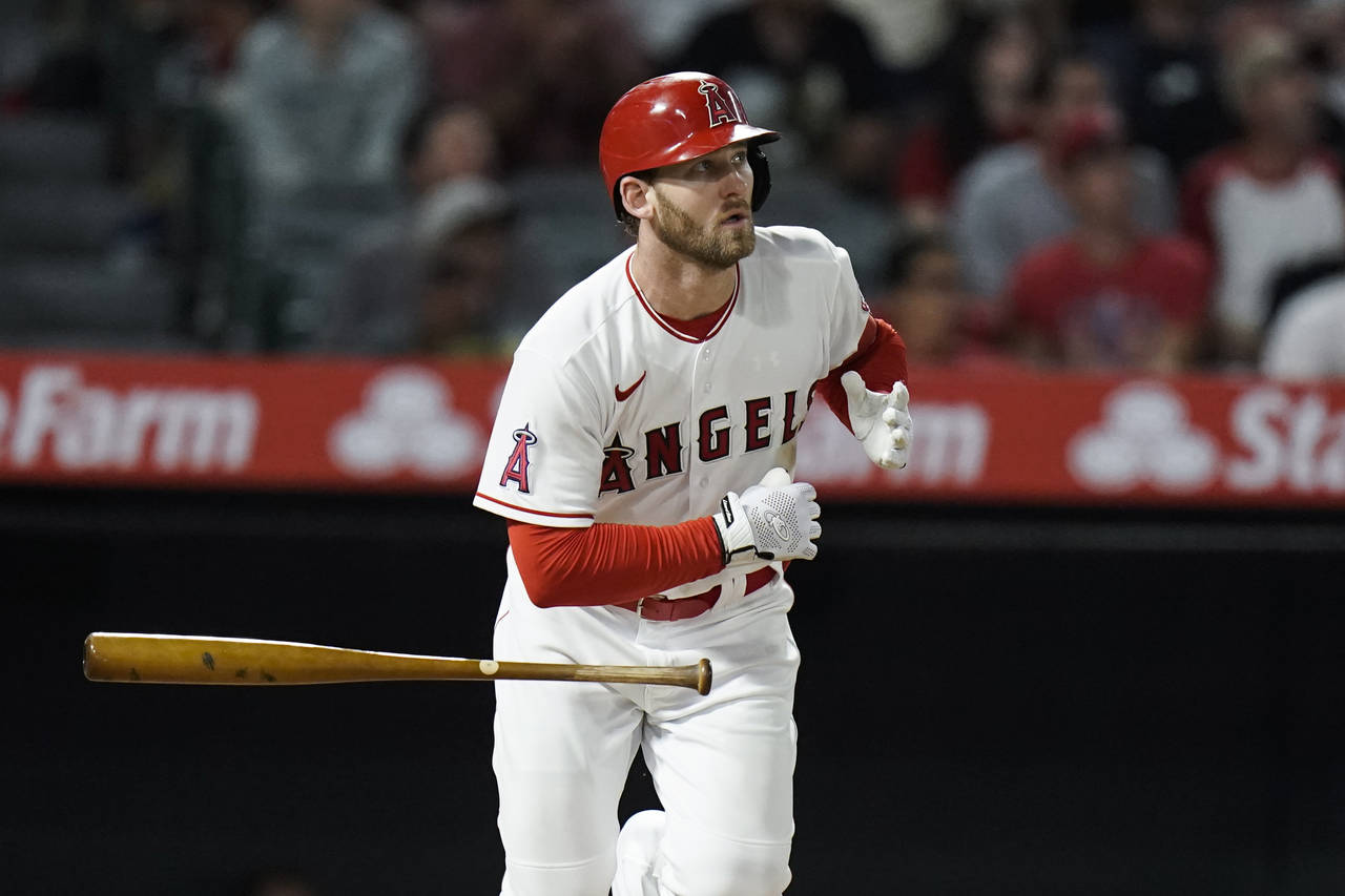 Los Angeles Angels' Taylor Ward watches after hitting a two-run double during the seventh inning of...