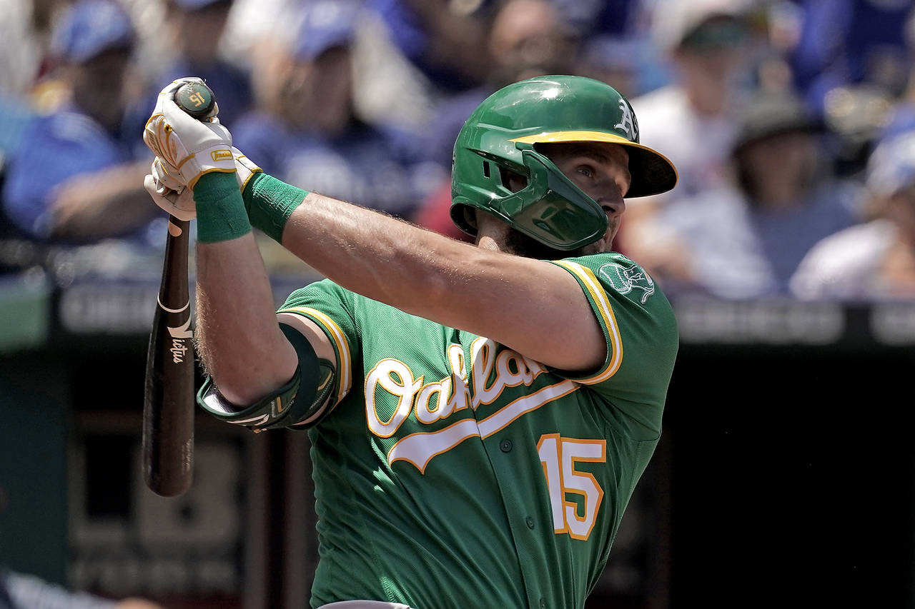 Oakland Athletics' Seth Brown watches his solo home run during the sixth inning of a baseball game ...
