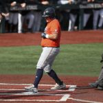 
              Auburn's Sonny DiChiara, center, crosses home plate after hitting a two-run home run during the third inning of an NCAA college baseball tournament super regional game against Oregon State on Monday, June 13, 2022, in Corvallis, Ore. (AP Photo/Amanda Loman)
            