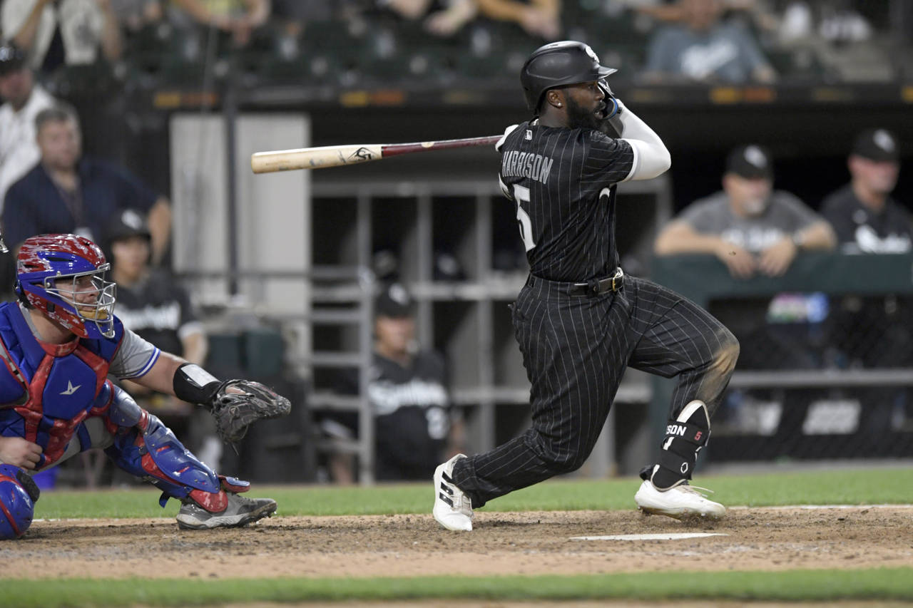 Chicago White Sox's Josh Harrison watches his walk-off RBI single to defeat the Toronto Blue Jays 7...