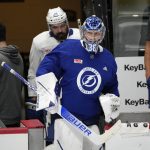 
              Tampa Bay Lightning goaltender Andrei Vasilevskiy takes the ice during an NHL hockey practice before Game 1 of the Stanley Cup Finals against the Colorado Avalanche, Tuesday, June 14, 2022, in Denver. (AP Photo/David Zalubowski)
            