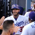 
              Los Angeles Dodgers' Cody Bellinger is congratulated by teammates in the dugout after hitting a solo home run during the second inning of a baseball game against the Cleveland Guardians Friday, June 17, 2022, in Los Angeles. (AP Photo/Mark J. Terrill)
            