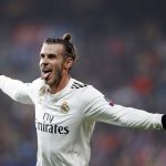 
              FILE - Real Madrid midfielder Gareth Bale celebrates after scoring his side's fourth goal during the Champions League group G soccer match between Real Madrid and Viktoria Plzen at the Doosan arena in Pilsen, Czech Republic, on Nov. 7, 2018. Los Angeles FC has reached a deal with Bale to move to Major League Soccer after his departure from Real Madrid, a person close to the deal told The Associated Press. The person spoke Saturday, June 25, 2022, on condition of anonymity because the details of the 12-month deal are still being finalized. (AP Photo/Petr David Josek, File)
            