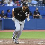 
              Chicago White Sox's Jose Abreu leaves the batter's box after hitting a two-run home run against the Toronto Blue Jays during the fourth inning of a baseball game Wednesday, June 1, 2022, in Toronto. (Jon Blacker/The Canadian Press via AP)
            