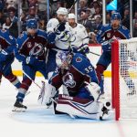 
              Colorado Avalanche goaltender Darcy Kuemper (35) lets the puck slip past for a goal by Tampa Bay Lightning left wing Ondrej Palat, not seen, during the third period in Game 5 of the NHL hockey Stanley Cup Final, Friday, June 24, 2022, in Denver. (AP Photo/Jack Dempsey)
            