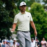 
              Xander Schauffele walks on the eighth hole during the second round of the Travelers Championship golf tournament at TPC River Highlands, Friday, June 24, 2022, in Cromwell, Conn. (AP Photo/Seth Wenig)
            