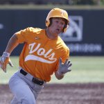 
              Tennessee's Seth Stephenson rounds third base as he scores on a double by Jorel Ortega in the seventh inning during an NCAA college baseball super regional game against Notre Dame Saturday, June 11, 2022, in Knoxville, Tenn. (AP Photo/Randy Sartin)
            