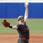 
              Oklahoma State's Kelly Maxwell (28) pitches during the first inning of the team's NCAA softball Women's College World Series game against Florida on Saturday, June 4, 2022, in Oklahoma City. (AP Photo/Alonzo Adams)
            