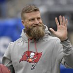 
              FILE - Tampa Bay Buccaneers quarterback Ryan Fitzpatrick waves to fans before an NFL football game against the New York Giants, Sunday, Nov. 18, 2018, in East Rutherford, N.J. Quarterback Ryan Fitzpatrick confirmed to The Associated Press on Friday, June 3, 2022, that he informed former teammates of his intention to retire a day earlier. Former Bills running back Fred Jackson first announced the news of Fitzpatrick’s retirement on his Twitter account by posting an image and message from his former Buffalo teammate. (AP Photo/Bill Kostroun, File)
            