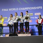 
              Silver medalists team of Australia, left, gold medalist team of United States, centre, bronze medalist team of Canada, right, pose with their medals after the Women 4x200m Freestyle Relay final at the 19th FINA World Championships in Budapest, Hungary, Wednesday, June 22, 2022. (AP Photo/Anna Szilagyi)
            