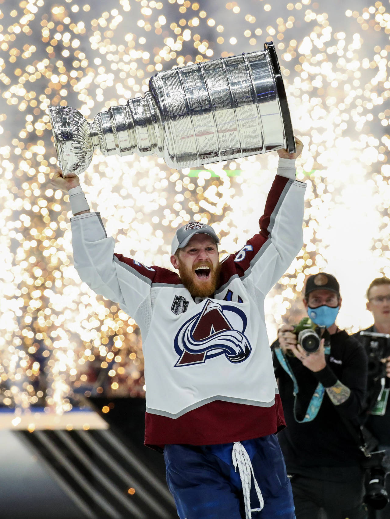 Colorado Avalanche left wing Gabriel Landeskog (92) holds the Stanley Cup after the Avalanche defea...