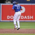 
              Toronto Blue Jays' Vladimir Guerrero Jr runs the bases after hitting a two-run home run, which also scored Bo Bichette, in the third inning of a baseball game against the Boston Red Sox in Toronto, Monday, June 27, 2022. (Jon Blacker/The Canadian Press via AP)
            
