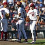 
              Arkansas pitcher Evan Taylor (39) relieves starting pitcher Zack Morris in the first inning against Mississippi during an NCAA College World Series baseball game, Monday, June 20, 2022, in Omaha, Neb. (AP Photo/John Peterson)
            