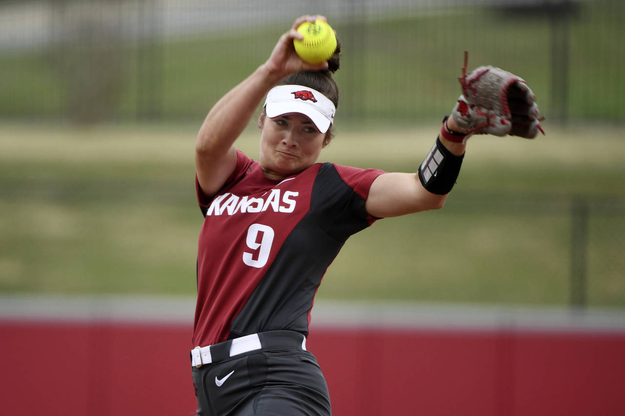 FILE - Arkansas pitcher Autumn Storms throws a pitch against Arkansas-Pine Bluff during an NCAA sof...