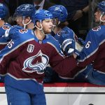 
              Colorado Avalanche left wing Andre Burakovsky is congratulated for his goal against the Tampa Bay Lightning during the first period in Game 2 of the NHL hockey Stanley Cup Final, Saturday, June 18, 2022, in Denver. (AP Photo/John Locher)
            