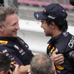 
              Red Bull driver Sergio Perez of Mexico celebrates with Team chief Christian Horner of Red Bull Racing after winning the Monaco Formula One Grand Prix, at the Monaco racetrack, in Monaco, Sunday, May 29, 2022. (AP Photo/Daniel Cole)
            
