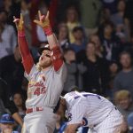 
              St. Louis Cardinals Harrison Bader celebrates his triple against the Chicago Cubs during the ninth inning of a baseball game, Sunday, June 5, 2022, at Wrigley Field in Chicago. (AP Photo/Mark Black)
            