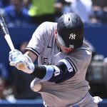 
              New York Yankees' Josh Donaldson is hit by a pitch from Toronto Blue Jays starting pitcher Yusei Kikuchi in first-inning baseball game action in Toronto, Sunday, June 19, 2022. (Jon Blacker/The Canadian Press via AP)
            