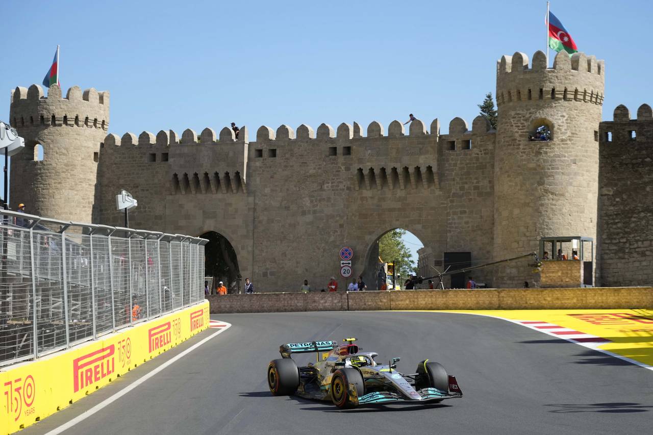 Mercedes driver Lewis Hamilton of Britain steers his car during the first free practice at the Baku...