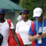 
              Serena Williams walks to the practice courts ahead of the 2022 Wimbledon Championships at the All England Lawn Tennis and Croquet Club, Wimbledon, england, Thursday June 23, 2022. (Steven Paston/PA via AP)
            