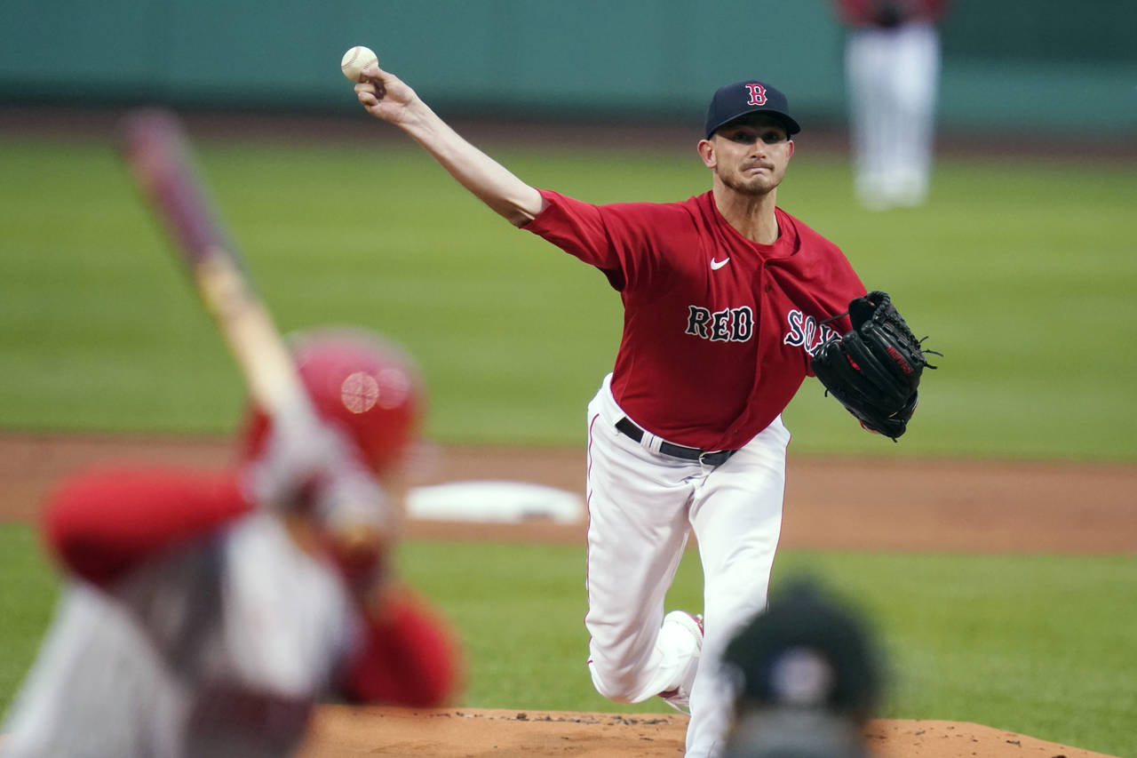 Boston Red Sox starting pitcher Garrett Whitlock delivers during the first inning of the team's bas...