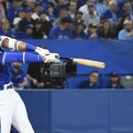 
              Toronto Blue Jays designated hitter Lourdes Gurriel Jr. hits a double in the fifth inning of a baseball game against the Baltimore Orioles in Toronto, Monday, June 13, 2022. (Jon Blacker/The Canadian Press via AP)
            